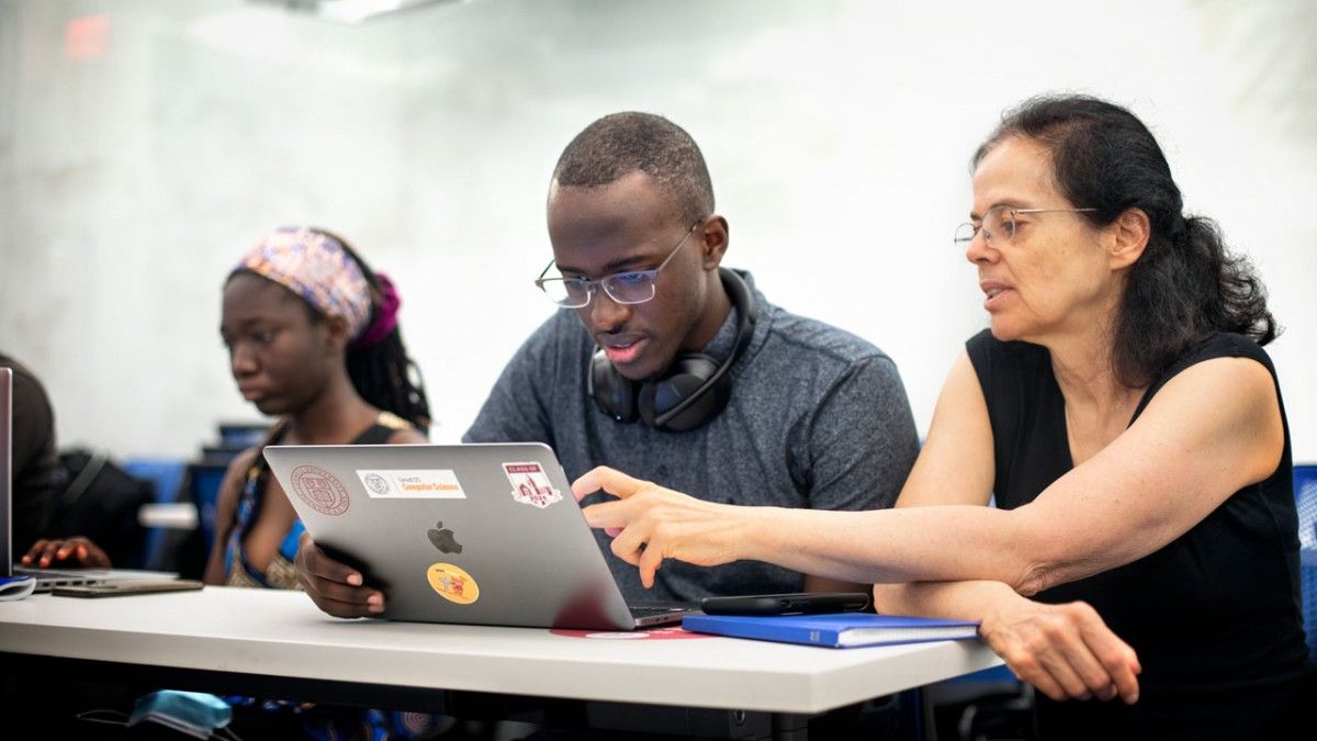Éva Tardos, the Jacob Gould Schurman Professor of Computer Science, works with students during the 2021 CSMore class in Gates Hall. Éva Tardos, the Jacob Gould Schurman Professor of Computer Science, works with students during the 2021 CSMore class in Gates Hall.