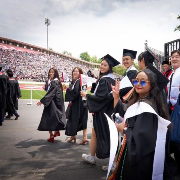 Graduates from Cornell Bowers CIS’s class of 2024 enter Schoellkopf Field before Commencement on Saturday, May 25.