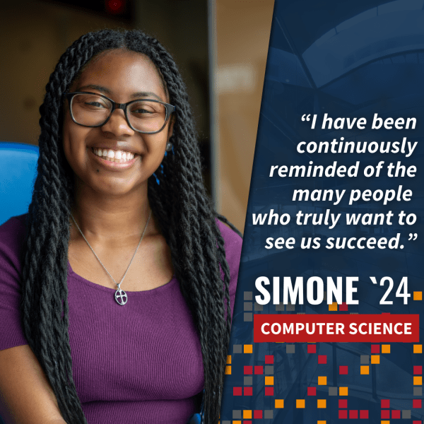Simone Green A color photo of a woman smiling for a photo