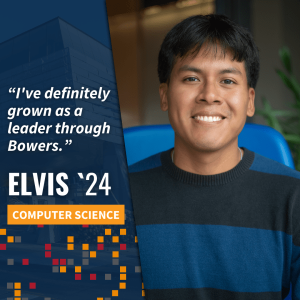 Elvis Marcelo A color photo of a man smiling for a photo