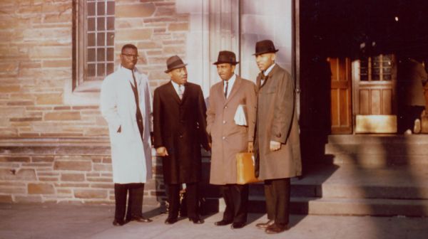 Provided by the family of Dr. Edward Hart Martin Luther King Jr. and colleagues stand outside Anabel Taylor Hall on Nov. 13, 1960, during King’s first visit to Ithaca. Left to right: Kenneth Hagood ’60, a Cornell student organizer; Martin Luther King Jr.; Provided by the family of Dr. Edward Hart Martin Luther King Jr. and colleagues stand outside Anabel Taylor Hall on Nov. 13, 1960, during King’s first visit to Ithaca. Left to right: Kenneth Hagood ’60, a Cornell student organizer; Martin Luther King Jr.;