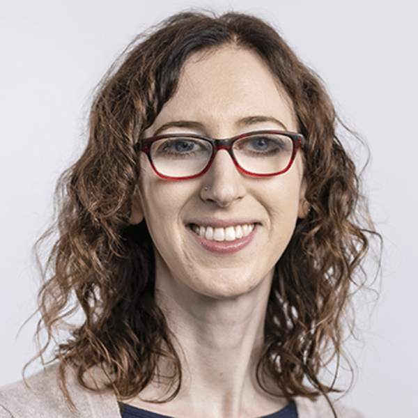 A color photo of a woman smiling