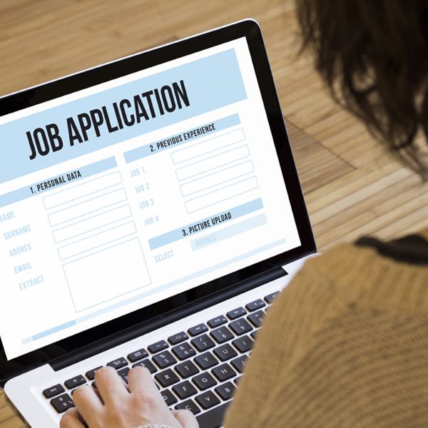 A color photo showing a person apply for a job on their computer Credit: McLittle Stock, Shutterstock